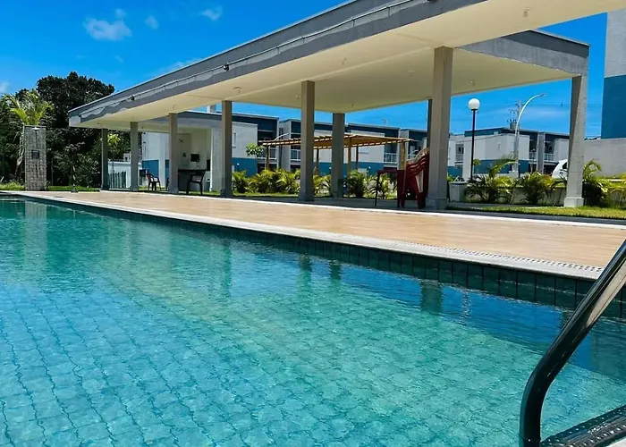 Aconchego da Alê em Porto, Ar condicionado e Piscina, Apartamento inteiro, Cozinha completa, Wifi, 02 Quartos confortáveis, travesseiro nasa , Colchão confortável ideal para férias descanso lazer ou negócios Porto Seguro